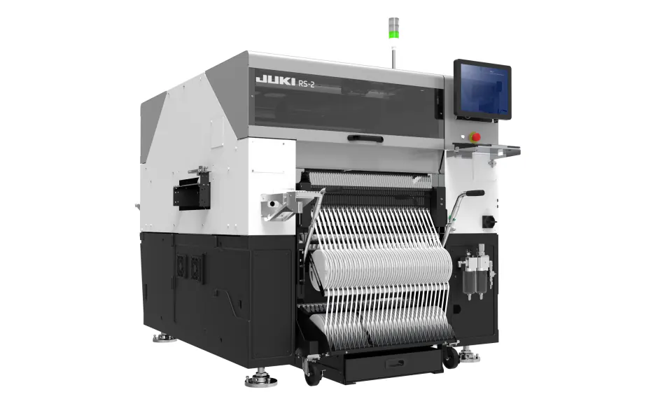 The JUKI RS-2 in three-quarter view, with the feeder bank at the front and the screen on top